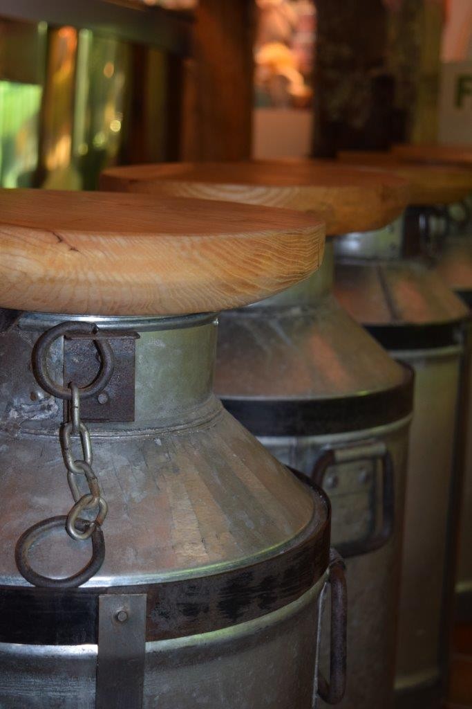 Sit comfortably on one of our converted milk churns